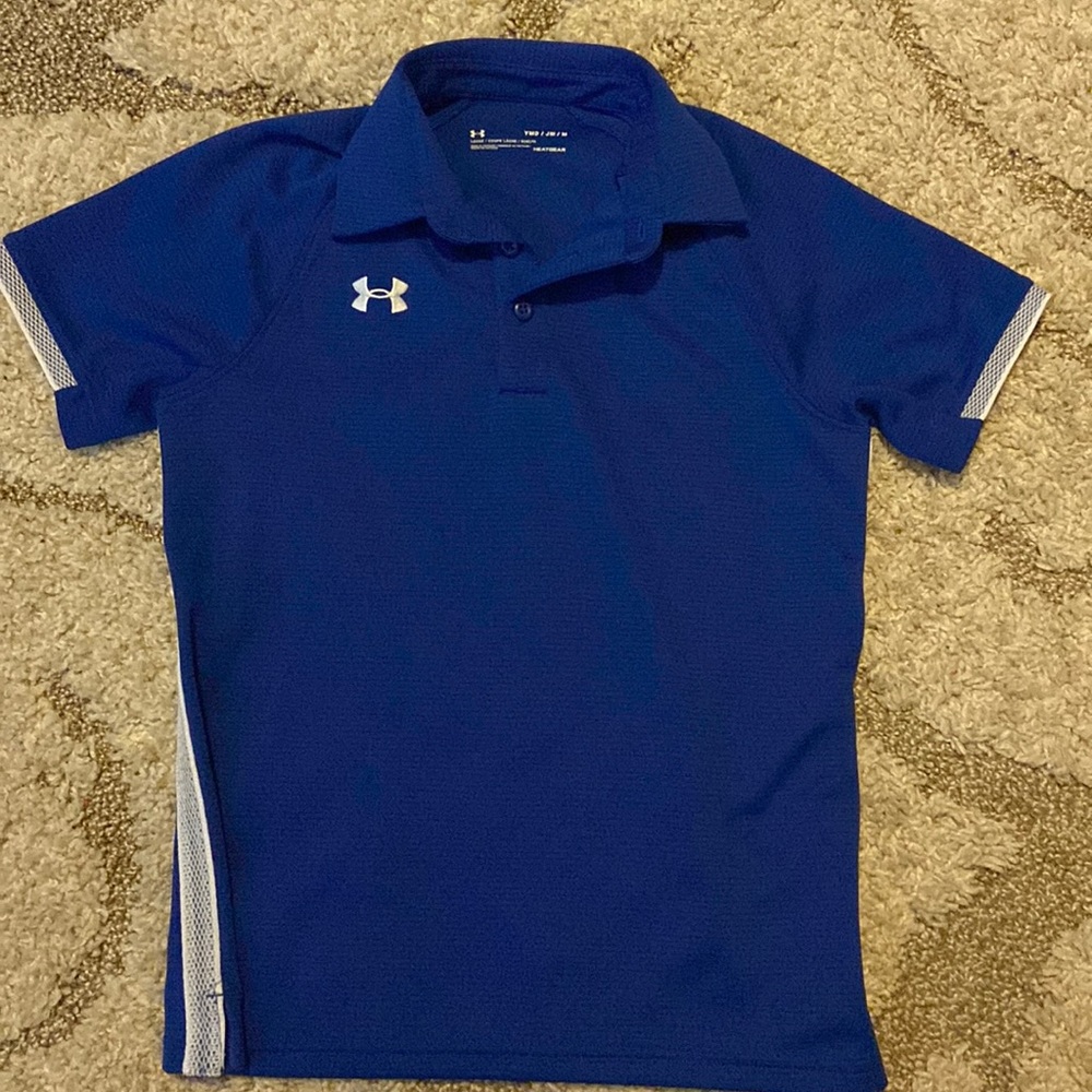 Royal blue polo with white netting details. Loose fit.
